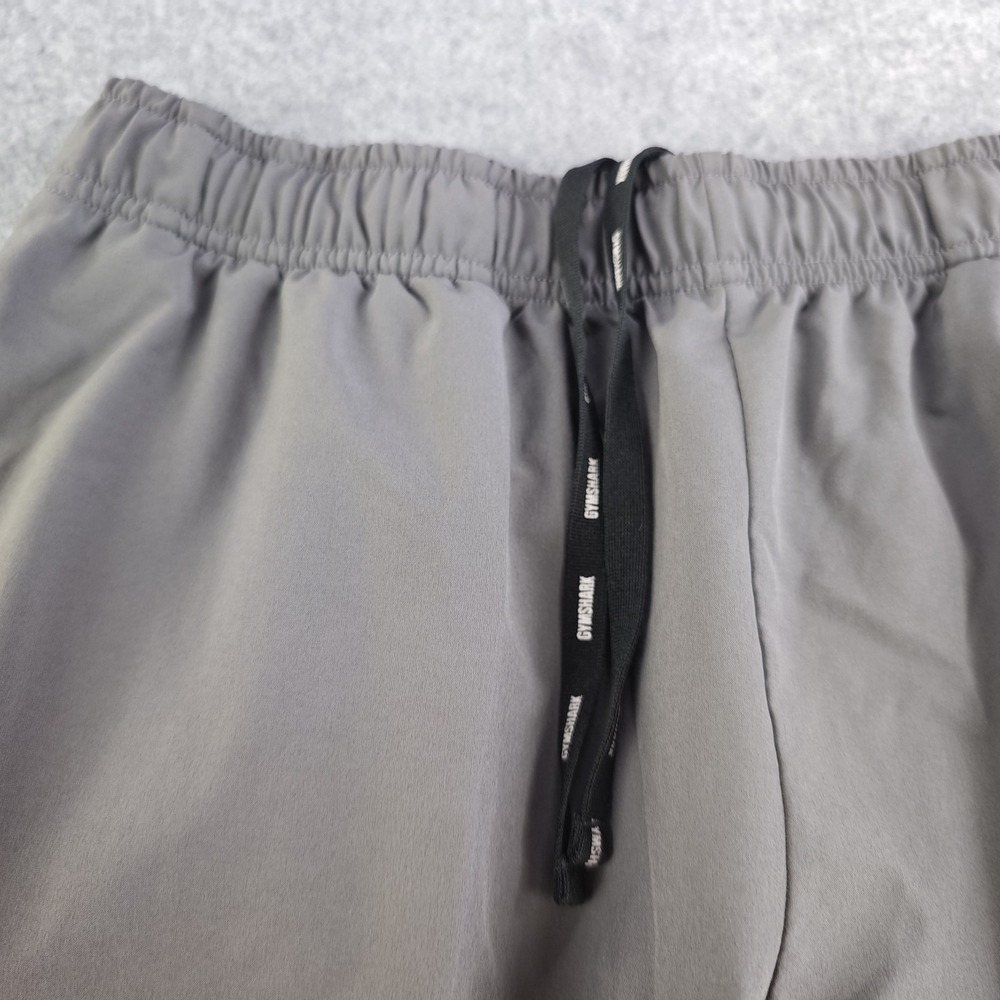 Gymshark Arrival Woven Joggers Mens Medium Silhouette Gray Zip Ankle Slim - Picture 3 of 13